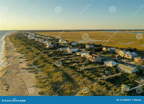 Aerial View Of Oak Island North Carolina Coast Line At Sunset With