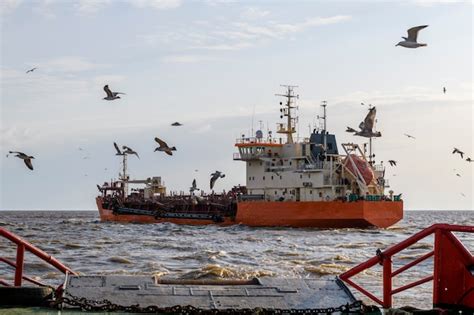 Premium Photo | Hopper dredger at sea. vessel engaged in dredging ...