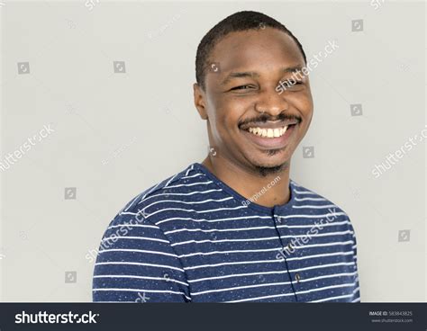 African Man Smiling Happiness Studio Portrait Stock Photo Edit Now