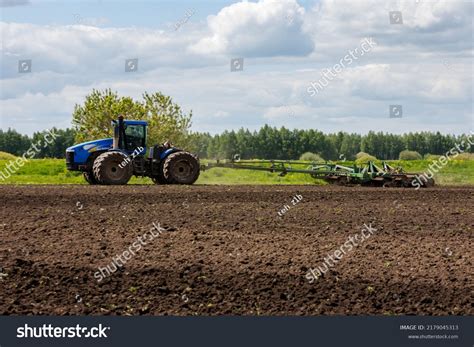 Blue New Holland Tractor Double Wheels Stock Photo