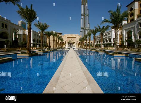 Swimming-pool of Palace Hotel with Burj Dubai at the back, Dubai ...