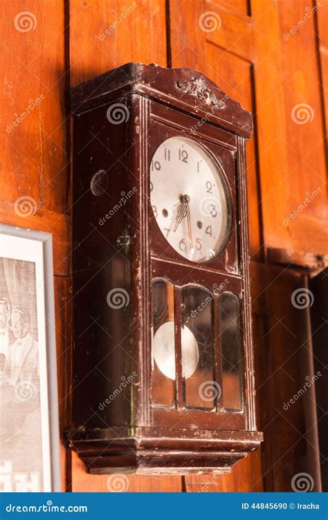 Antique Pendulum Wall Clock Stock Photo - Image of antique, clock: 44845690