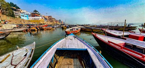 Boats Lined Up On Ganga Ganges River In Varanasi India Stock Photo