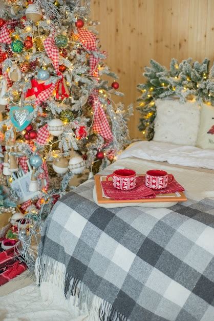 Premium Photo Christmas Decor With Hot Drinks In Cups Near The Christmas Tree