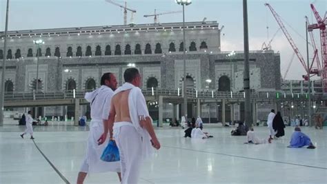 Close Up Of Muslim Pilgrims In Ihram Dress Performing Hajj Performing