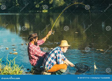 Man Fisherman Catches A Fish Fly Fishing Is Most Renowned As A Method