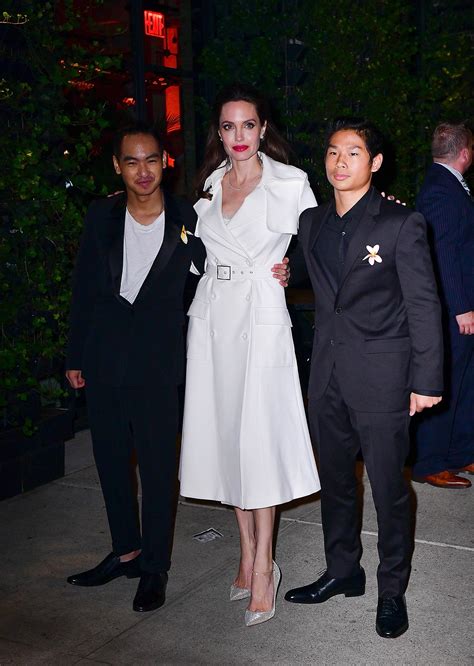 Angelina Jolie Poses With Sons Maddox And Pax At Film After Party In