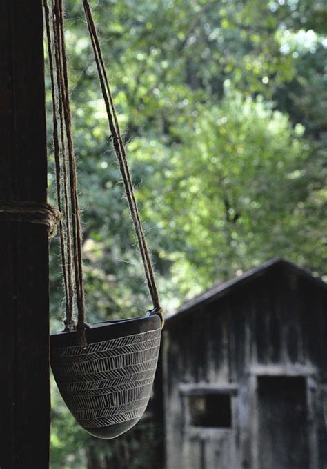 Black Hanging Planters In Time For Halloween - Gardenista