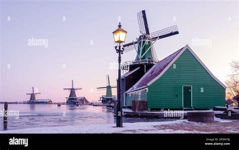 Zaanse Schans Windmill Village During Winter With Snow Landscape In The