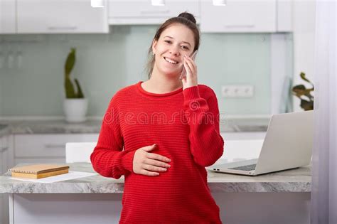 Cheerful Future Mother Has Pleasant Conversation With Close Friend Speaks Via Smart Phone