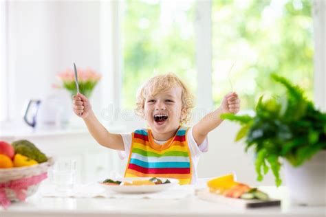 Baby Eating Vegetables. Solid Food for Infant Stock Image - Image of ...