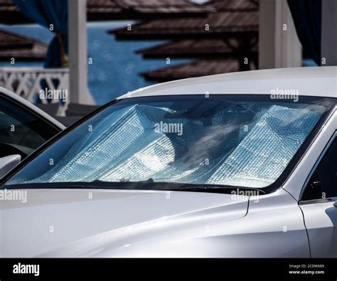 Protection of the car panel from direct sunlight. Sun Reflector ...