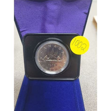 1975 Canadian silver dollar - Schmalz Auctions