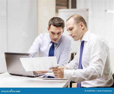 Two Businessmen Having Discussion In Office Stock Image Image Of