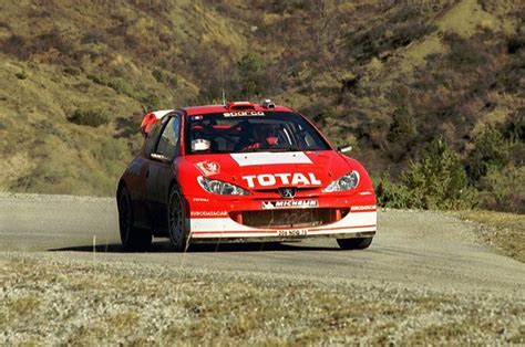 Peugeot Wrc Gilles Panizzi Peugeot Race Cars Course Automobile