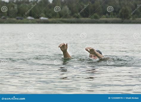 Man is Drowning on the Lake Stock Photo - Image of palm, drowning ...