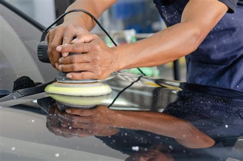 A Person Buffing a Car · Free Stock Photo