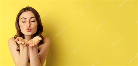 Free Photo Close Up Portrait Of Beautiful Coquettish Woman Sending