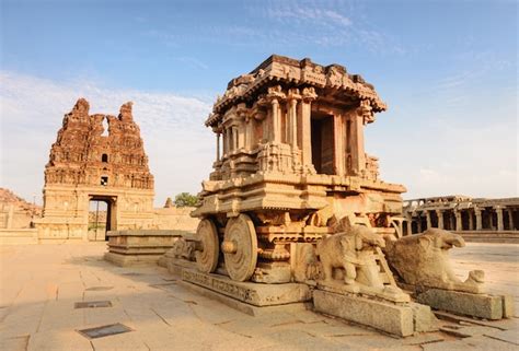 Premium Photo | Stone chariot in Hampi Vittala Temple at sunset