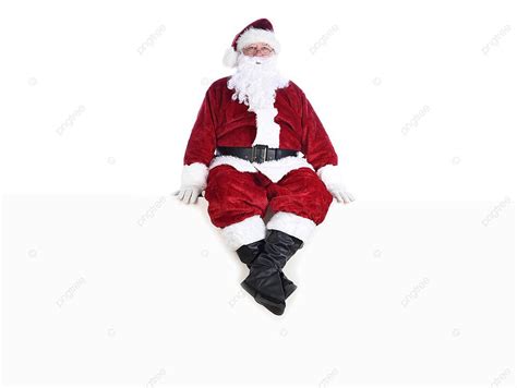 Santa Man Sitting On White Wall Isolated With Copy Space Photo