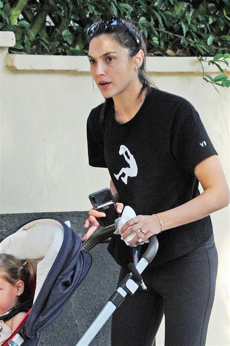 gal gadot taking her baby daughter out for a stroll in london, uk-040918_3