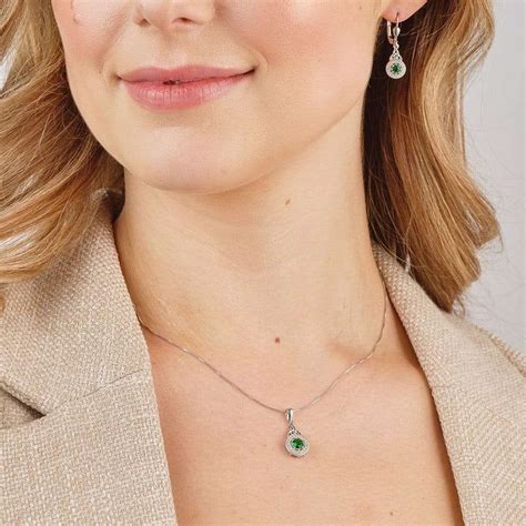 Silver Trinity Knot Necklace With Green CZ And Clear CZ Halo