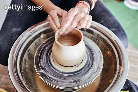 Woman S Hands Molding Clay Potter Making Ceramic Pot In Pottery