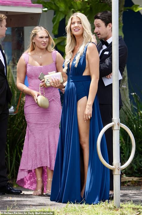 Anna McEvoy Upstages The Bride As She Goes Braless In A Racy Blue Dress