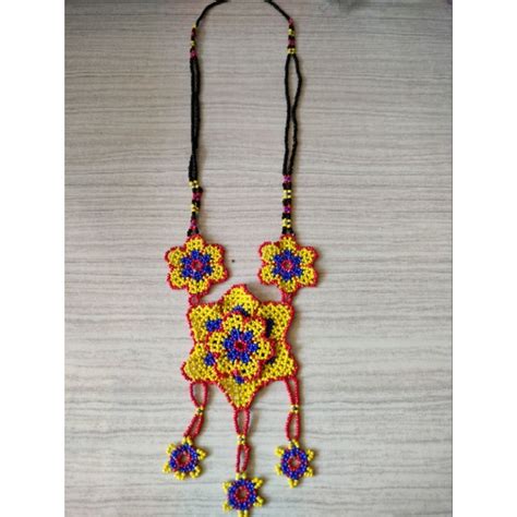 Jual Kalung Manik Etnik Dayak Tameng Ubur Ubur Gurita Lonceng Kalung