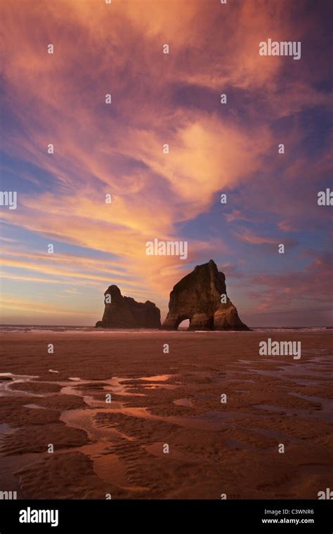 Sunset At Wharariki Beach And Archway Islands Golden Bay South Island