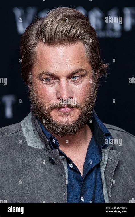 Travis Fimmel Poses For Photographers Upon Arrival At The Premiere Of