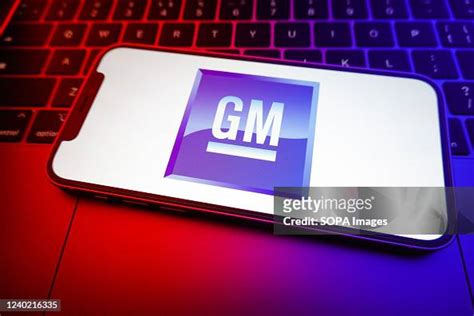 In this photo illustration, a General Motors logo seen displayed on a... News Photo - Getty Images