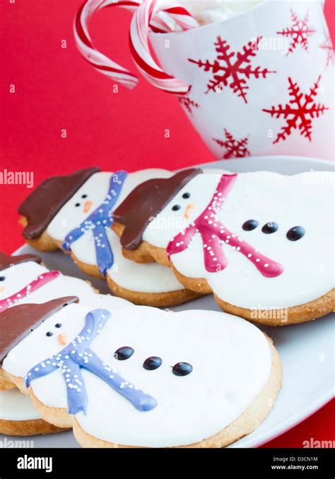 Hot Chocolate With Peppermint Canes And Snowman Sugar Cookies Stock Photo Alamy