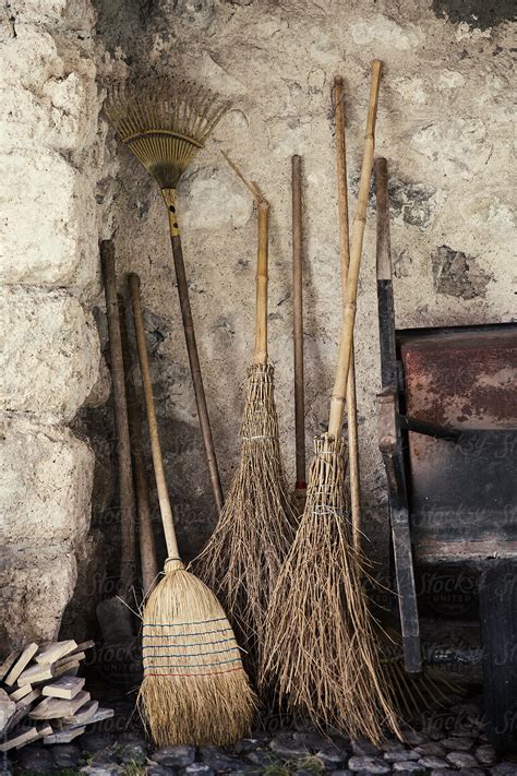 Collection Of Old Fashioned Brooms By Stocksy Contributor Ruth Black