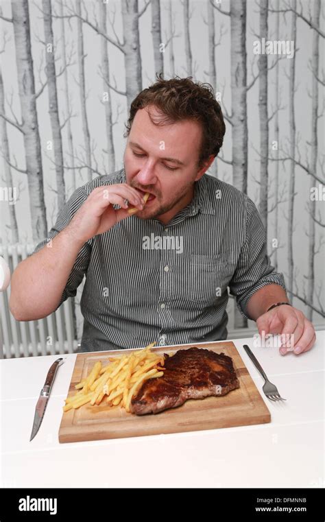 Man Eating Steak Hi Res Stock Photography And Images Alamy