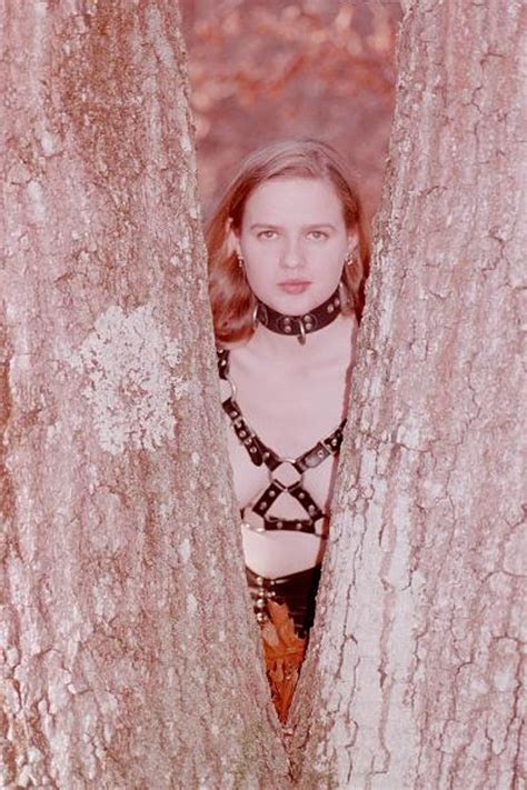 Desirable Bint Poses Completely Naked In The Woods Photos