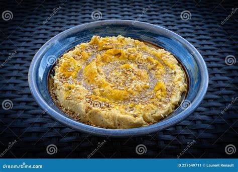 Hummus Or Houmous Appetizer Made Of Mashed Chickpeas Tahini Lemon