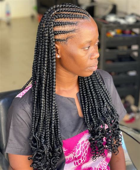 Step-by-step videos explain how creative half cornrows half box braids are done 12