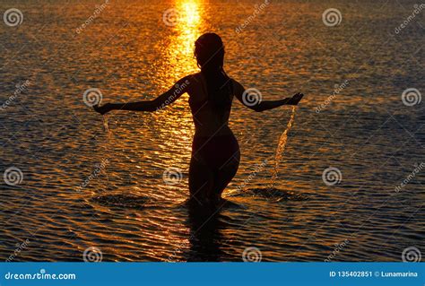 Girl Silhouette At Beach Sunset Open Arms Stock Image Image Of Ocean