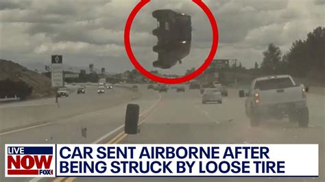 Watch Car Goes Airborne Flips After Hitting Loose Tire On La Freeway