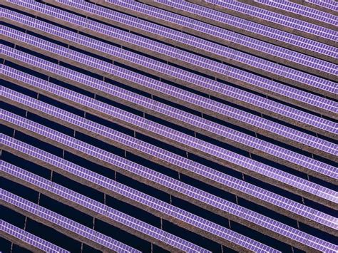 Premium Photo Aerial View Of Many Panels Of Solar Cells In A Row On