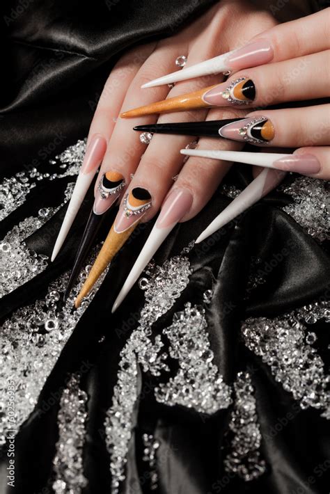 extremely long nails Stock Photo | Adobe Stock