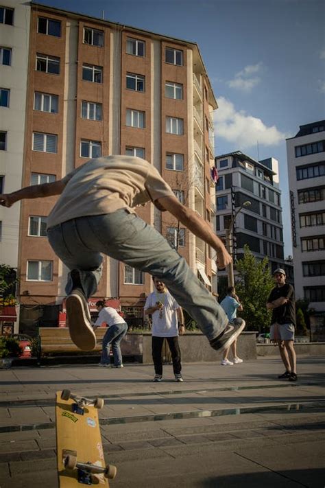 A Skater Doing Tricks on a Public Park · Free Stock Photo