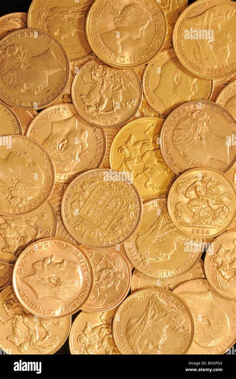 Gold coins collection of Gold sovereigns and half sovereigns Stock Photo - Alamy