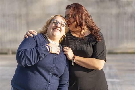 Couple Of Lesbian Women Hugging In A Park Stock Image Image Of