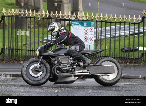 A man rides a motorcycle as filming continues in Glasgow for a new ...