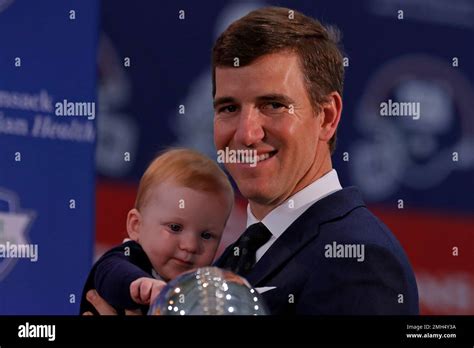 New York Giants Nfl Football Quarterback Eli Manning With His Son