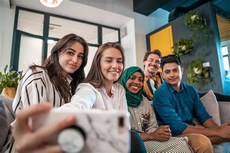 Group Of Business People During Break From The Work Taking Selfie