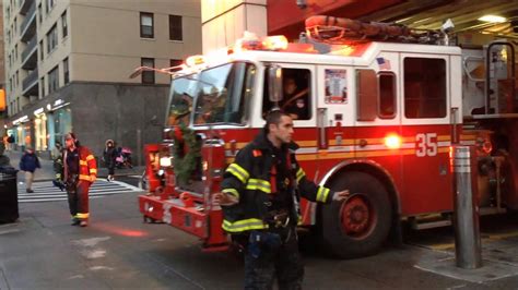 FDNY TOWER LADDER 35 RESPONDING FROM IT S FIREHOUSE ON WEST 66TH STREET