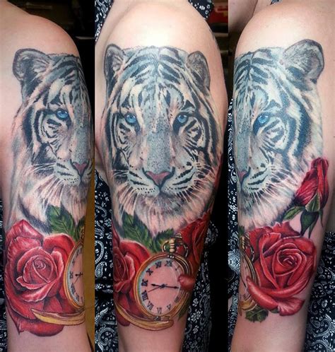 15 Best Tiger And Rose Tattoo Designs Petpress Rose Tattoo Sleeve